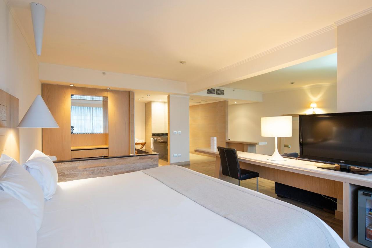 מלון Wyndham Concepcion Pettra מראה חיצוני תמונה A room at the hotel