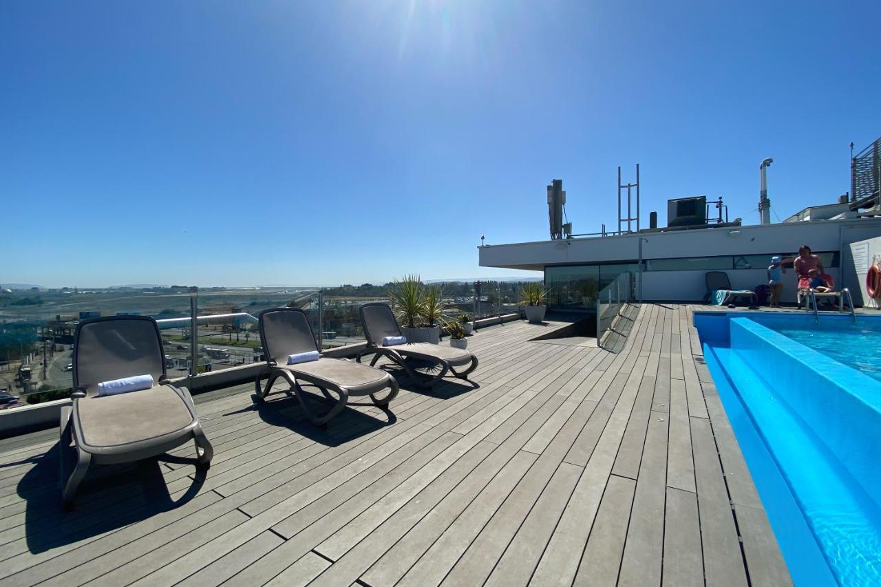 מלון Wyndham Concepcion Pettra מראה חיצוני תמונה Rooftop pool at the hotel